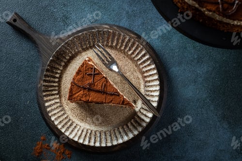 Preview: Plate with slice of chocolate cake. Space for text. Cake flatlay. Piece of chocolate cake