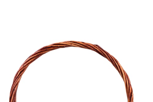 Preview: Wicker handle made of willow branches. Isolated over white background. Close-up.