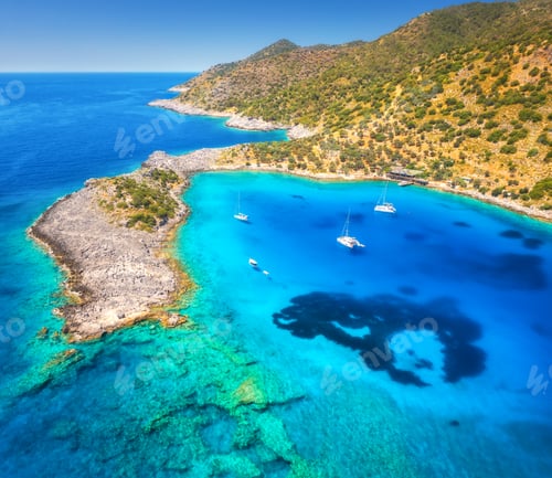 Preview: Aerial view of beautiful yachts and boats on the sea at sunset