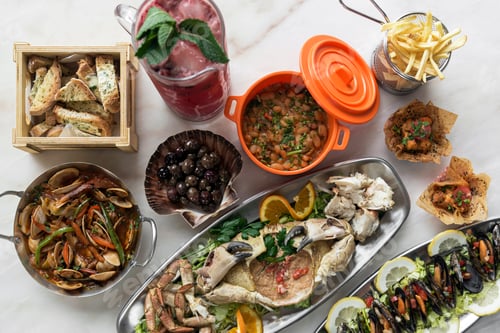 Preview: mixed fresh portuguese gourmet seafood set on white table
