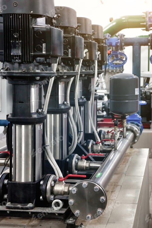 Preview: Industry pumps in an technical room. Industrial interior of water pump, valves, pressure gauges
