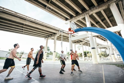 Preview: Men on basketball court watching basketball go through hoop