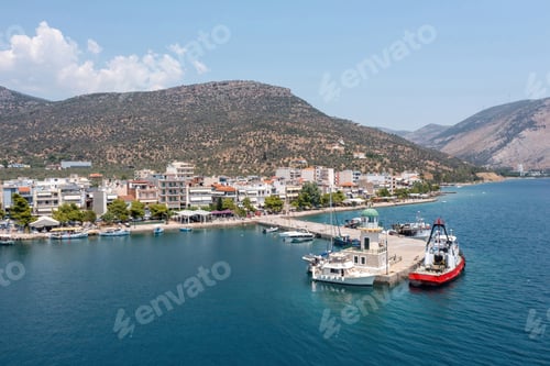Preview: Antikyra Greece, aerial drone view. Coastal village and boats in Boeotia