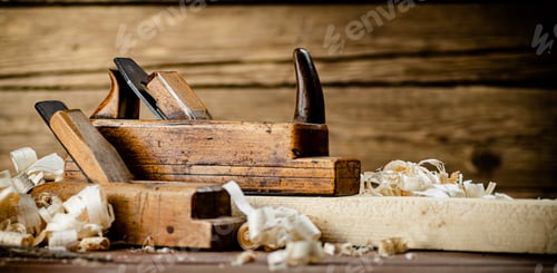 Preview: Working tool. Planer with wooden shavings.
