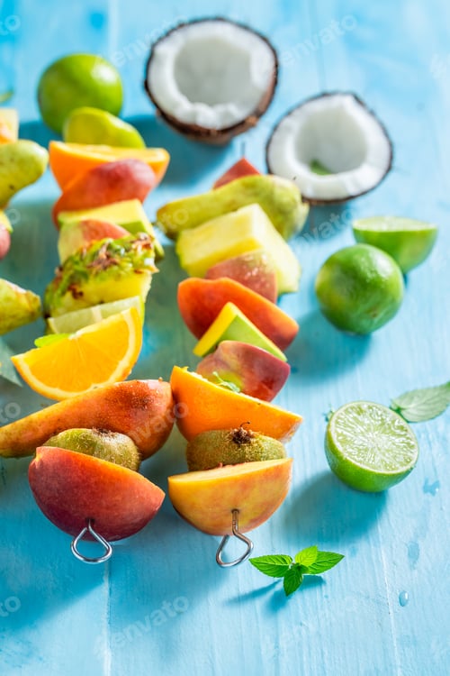 Preview: Colorful Fresh Fruit Skewers with Limes and Coconut