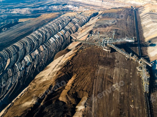 Preview: Mining equipment in a brown coal open pit mine near Garzweiler, Germany. Aerial View