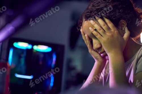 Preview: Stressed Teenage Girl Being Bullied Online Whilst Gaming At Home