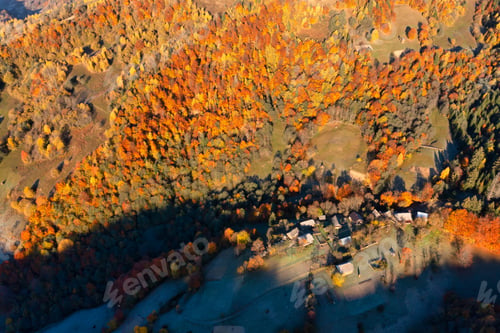 Preview: Mountain ridge with terracotta forests under cloudy sky