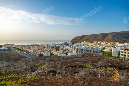 Preview: Coastal town of Palm Mar in Tenerife, showing residential buildings stretching towards the ocean