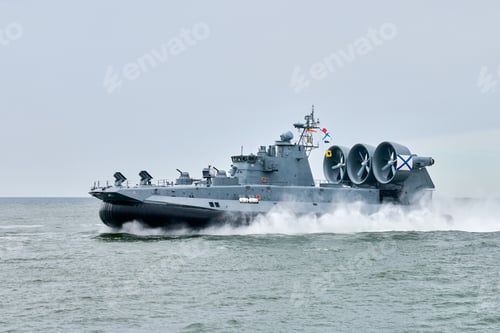Preview: Hovercraft warship armed with armament sails into sea toward military target to attack and destroy