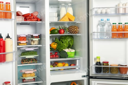 Preview: Open refrigerator full of different fresh products