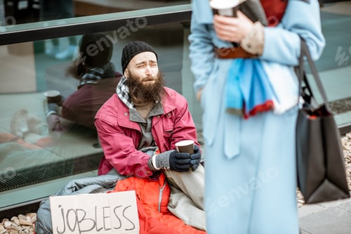 Preview: Homeless begging money to a passing by woman