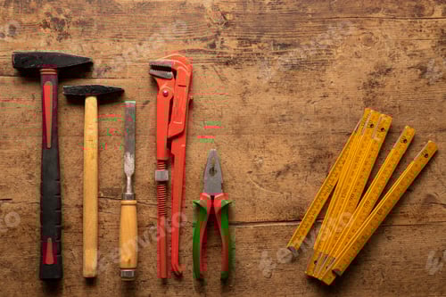 Preview: Old vintage hand tools on wooden background