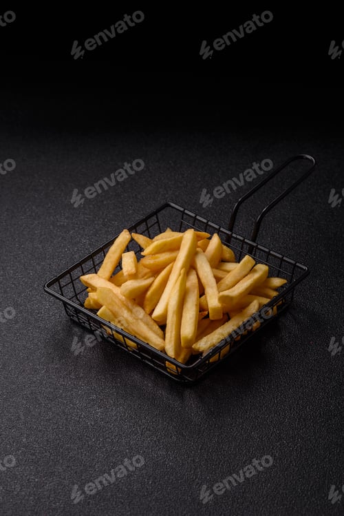 Preview: French fries are salty, crispy, and fried in oil, unhealthy takeaway food. French fries
