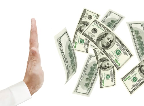 Preview: Hand and falling money isolated on white background
