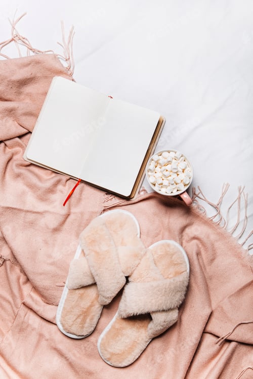 Preview: Open Notebook with Slippers and Marshmallows Still Life