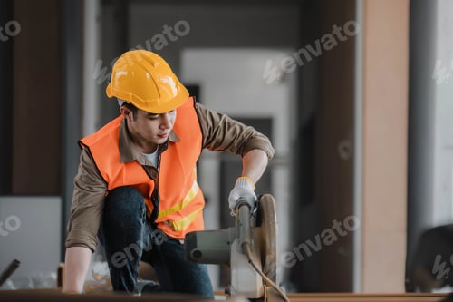 Preview: Carpenter working on wood craft at workshop to produce construction material or wooden furniture