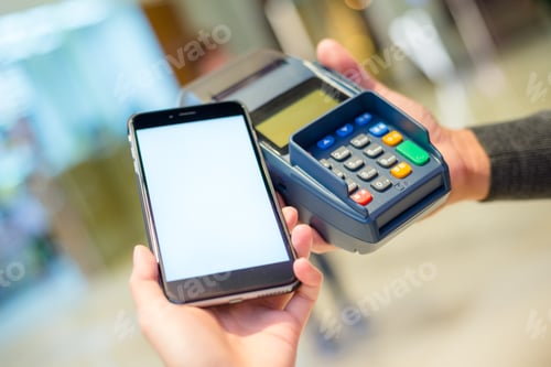 Preview: Customer using mobile phone for payment