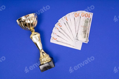 Preview: Gold Cup and money on blue background