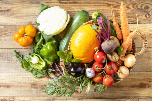Preview: Big basket with different fresh farm vegetables. Vegetarian. Harvest.