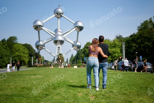 Preview: Young Hispanic couple looking at Atomium, Brussels, Belgium