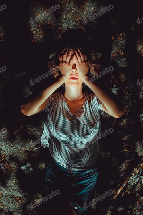 Preview: Woman lying on ground