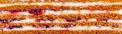 Preview: Layers of delicious cake with cream and fruit filling