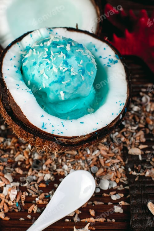 Preview: Blue ice cream in coconut bowl. Summer vacation