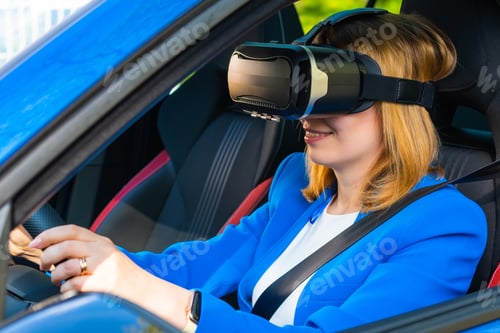 Preview: Business woman in the VR googles sitting in the car and turning the steering wheel in a car