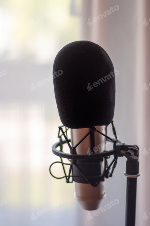 Preview: Close up of microphone in a studio room.