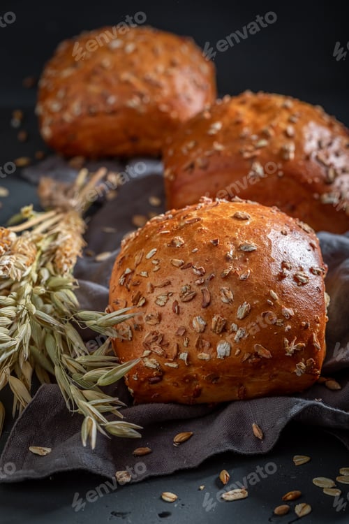 Preview: Rustic and healthy oat buns made of wheat grains.