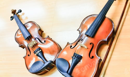 Preview: Wooden classic violin instruments on wooden wall background