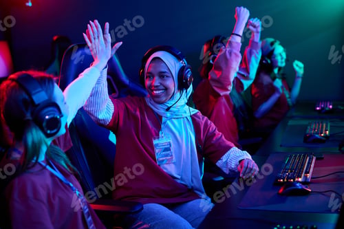 Preview: Diverse Teenager Girls Team Celebrating Victory While Playing Esports Game Together