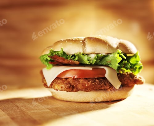 Preview: crispy chicken sandwich with bacon and swiss cheese.