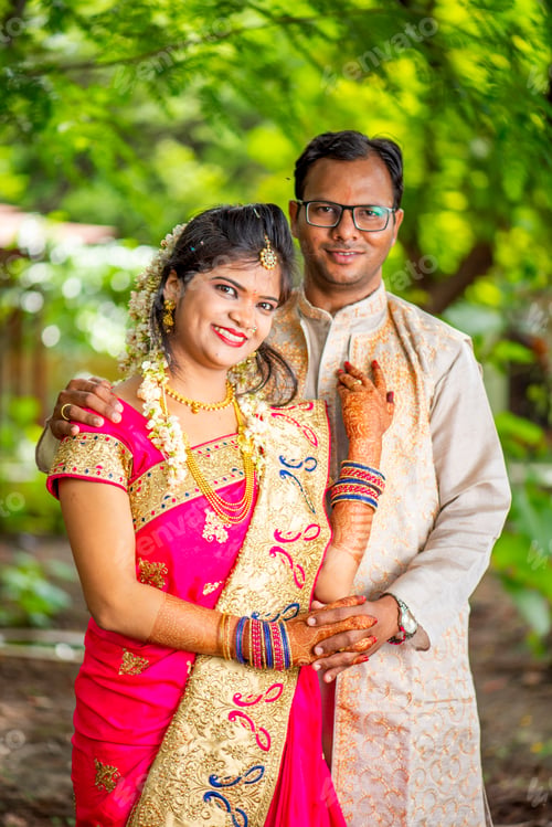 Preview: Portrait of beautiful young indian couple at outdoor