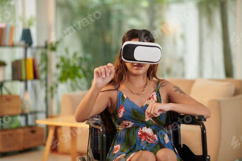 Preview: Woman in Wheelchair Playing Videogame