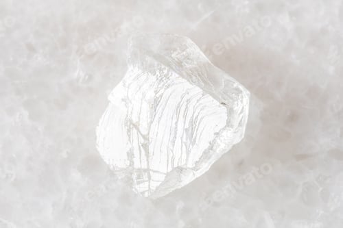 Preview: rough goshenite colorless beryl mineral on white