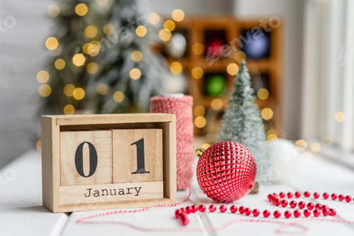 Preview: Beautiful multi-colored Christmas decorations on a light wooden table