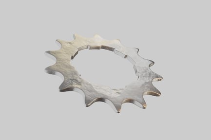 Preview: Serrated metallic gear with perforations