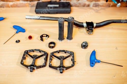 Preview: Working place with bicycle parts and wrenches