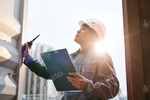 Preview: Dock worker in sunlight