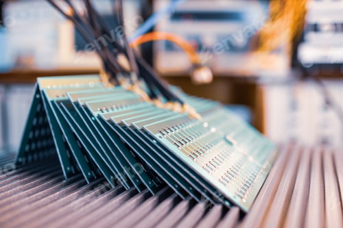 Preview: Close-up side view of a panel of SMD resistors