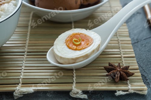 Preview: Cutted tea egg with star anise on bamboo mat