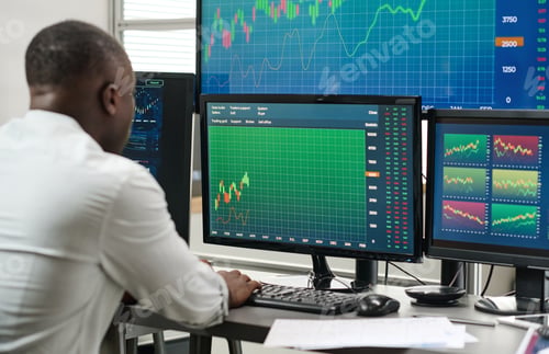 Preview: Broker Working On Computer