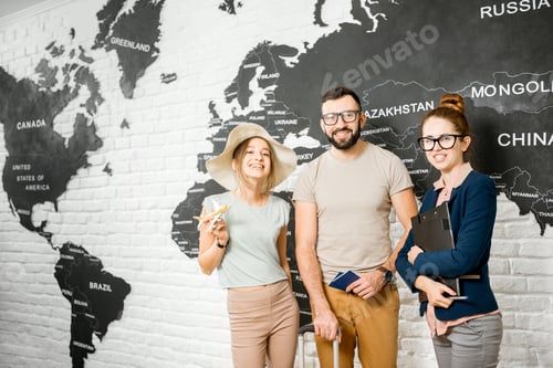 Preview: Couple with travel agent at the office