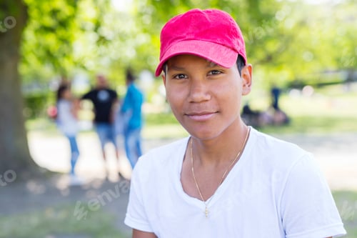 Preview: Portrait of teenage boy (14-15) in park