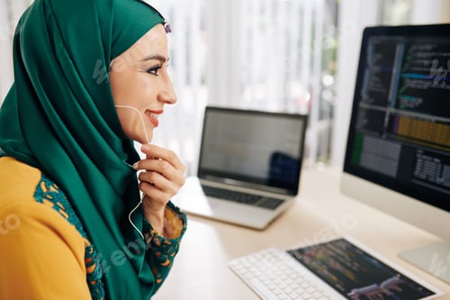 Preview: Smiling coder calling coworker