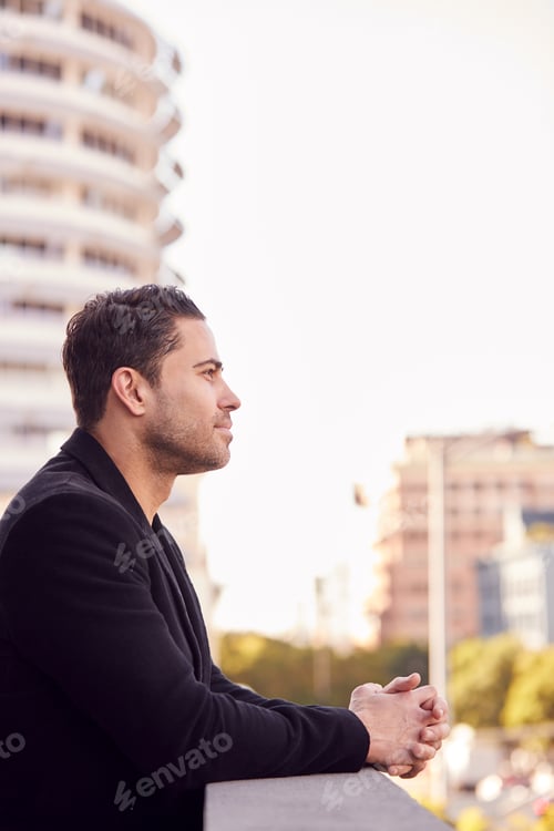 Preview: Profile Shot Of Businessman Standing Outside Office Building With City Skyline In Background