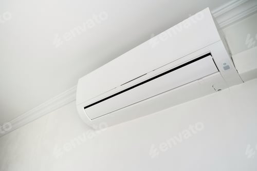 Preview: Wall-Mounted Air Conditioner in All-White Room
