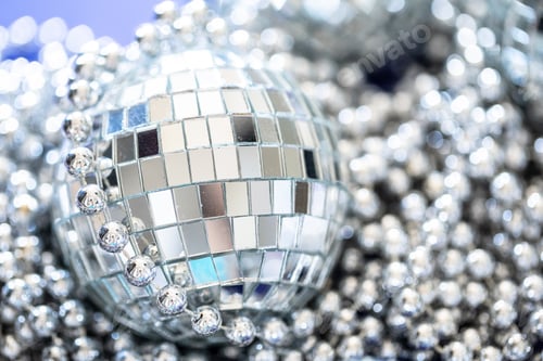 Preview: Sparkling disco ball in a day light. Concept of party